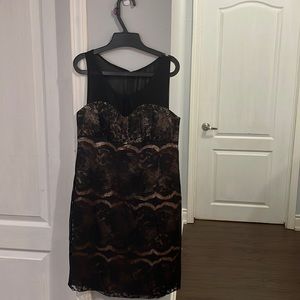 A beautiful chick lovely black dress with satin nude base.